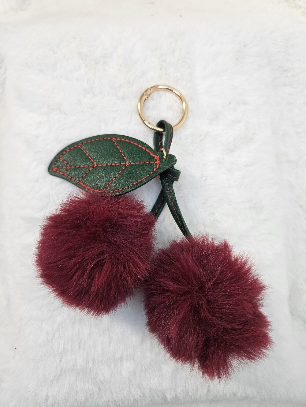 Faux Fur Cherry Pom Keychain with Green Leaf Accent - Burgundy
